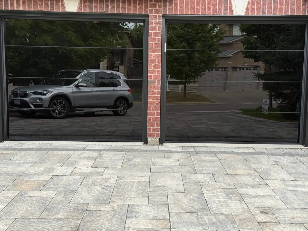 Full-view glass double garage door close-up — Toronto