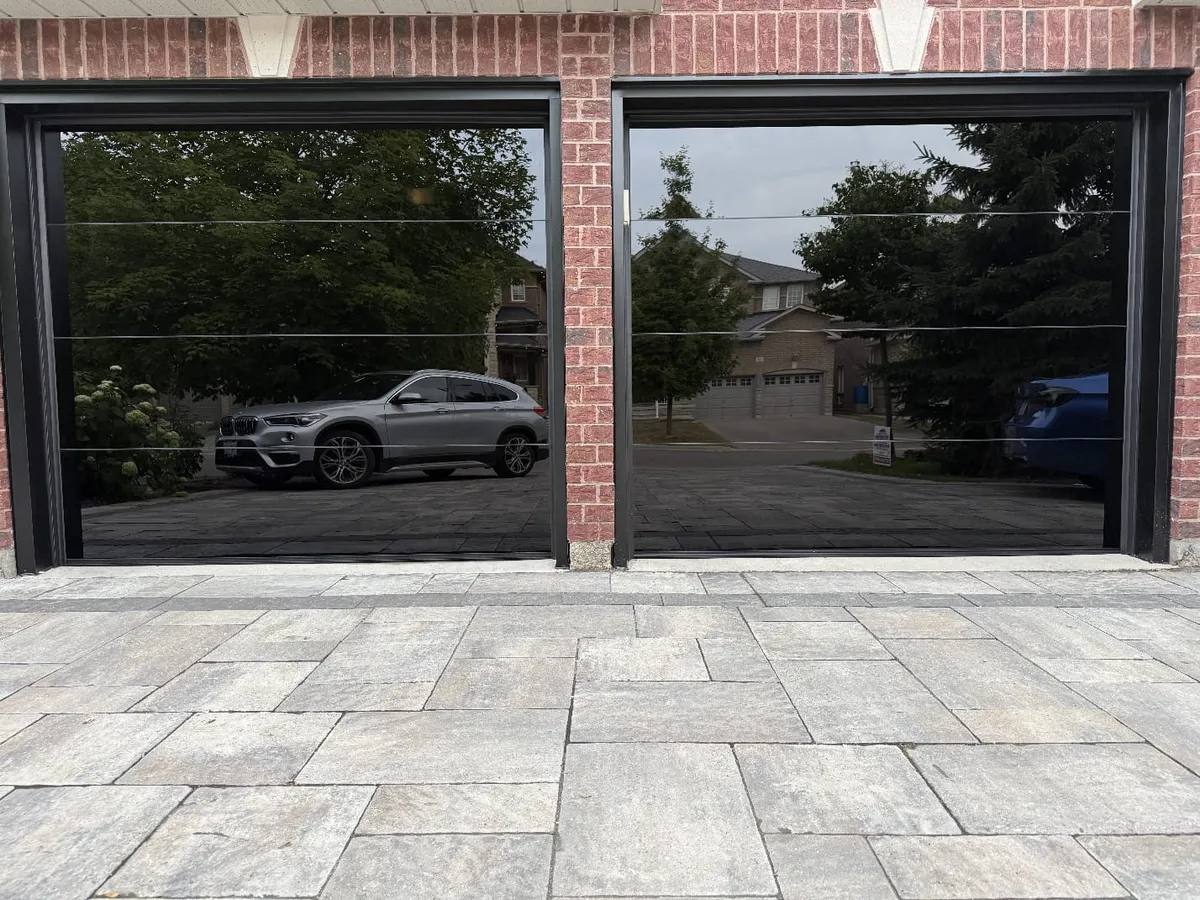 Full-view glass panel double garage door installation — Toronto