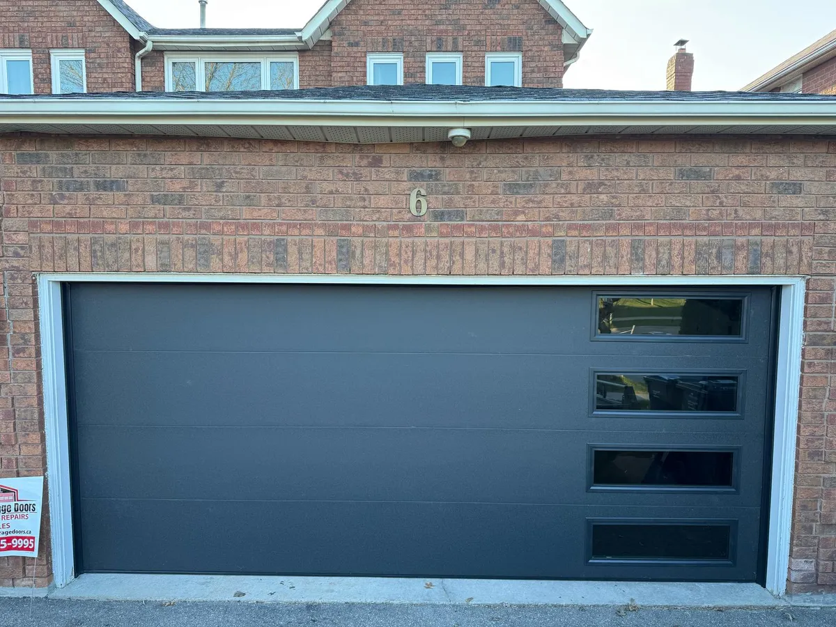 Charcoal double garage door with side windows