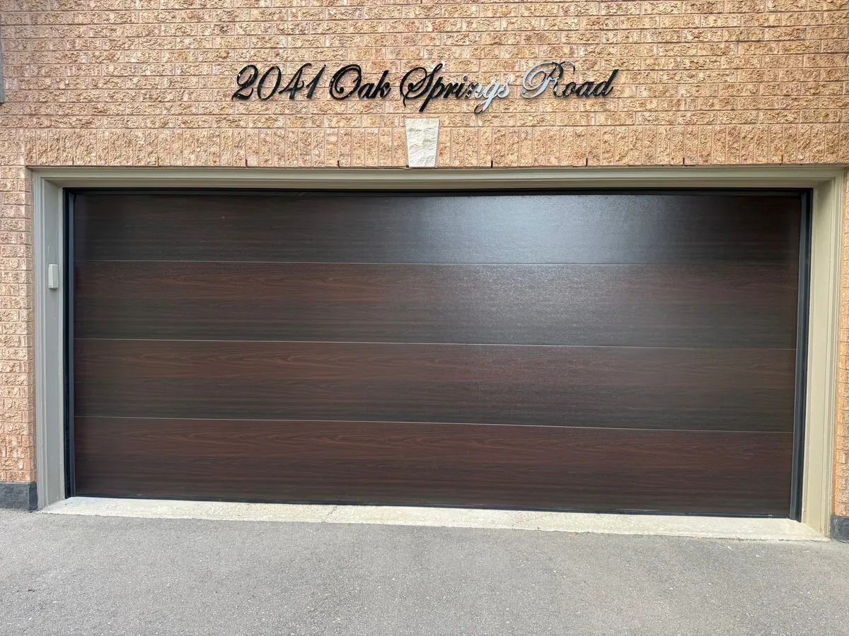 Espresso flush-panel double garage door installation — Mississauga