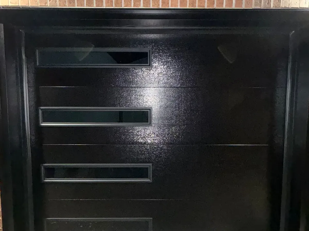 Modern steel door with horizontal glass strip