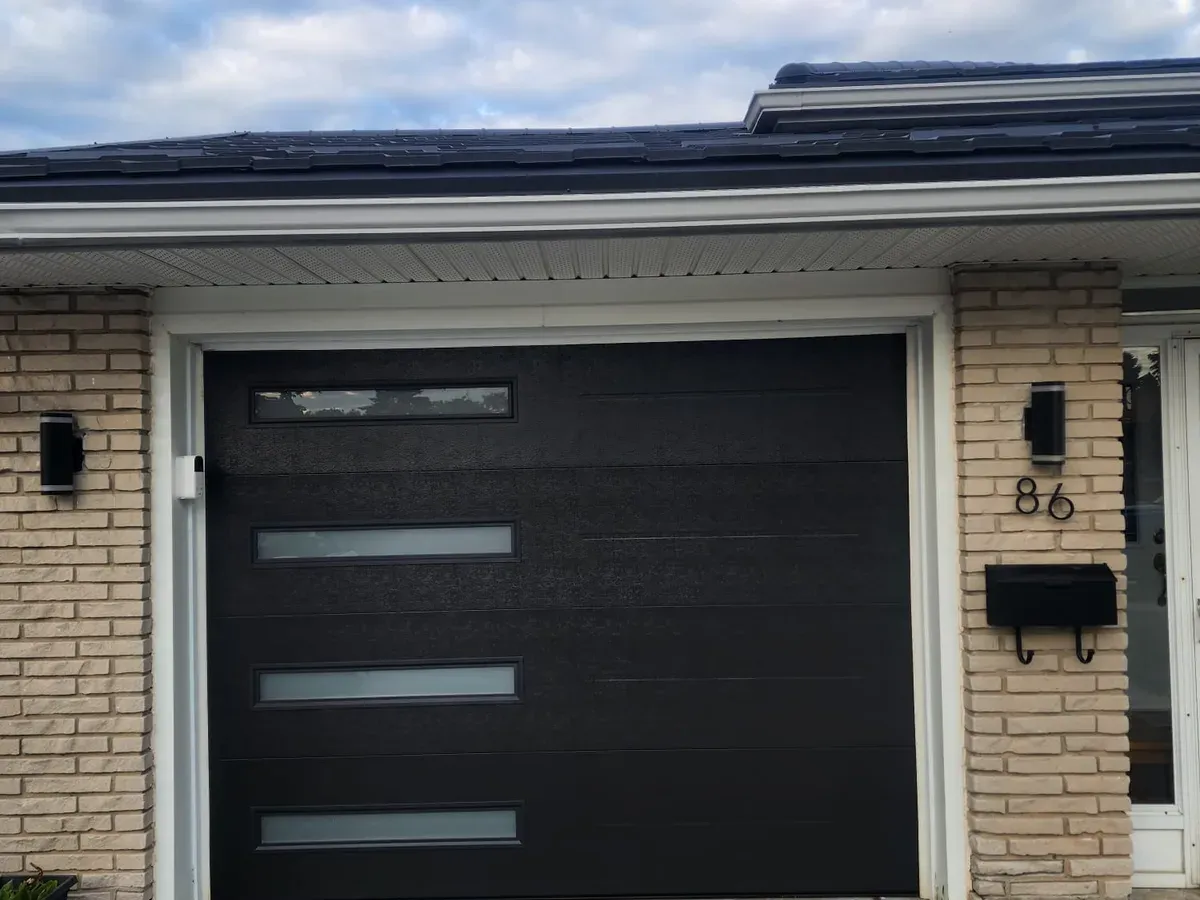 White steel garage door with arch windows